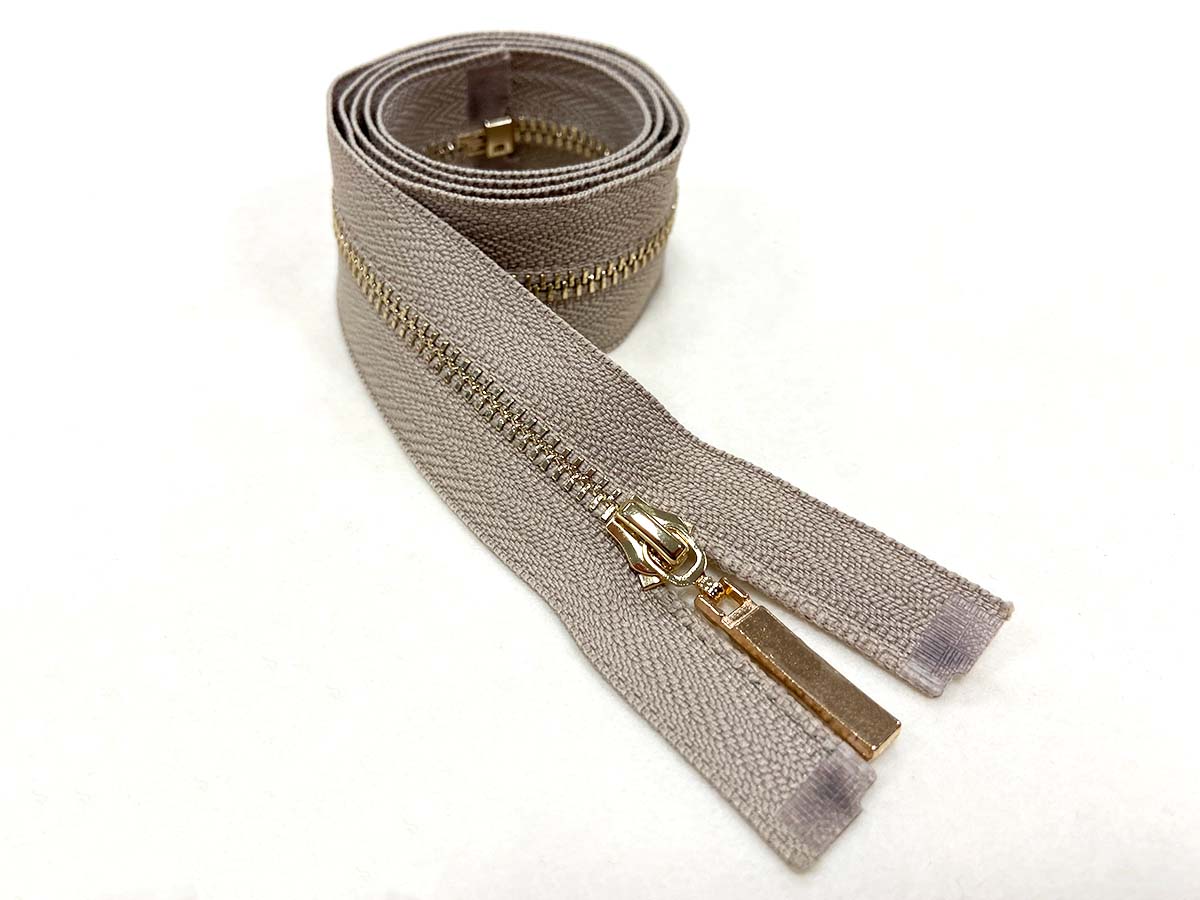 Reißverschluss in beige/gold - teilbar    