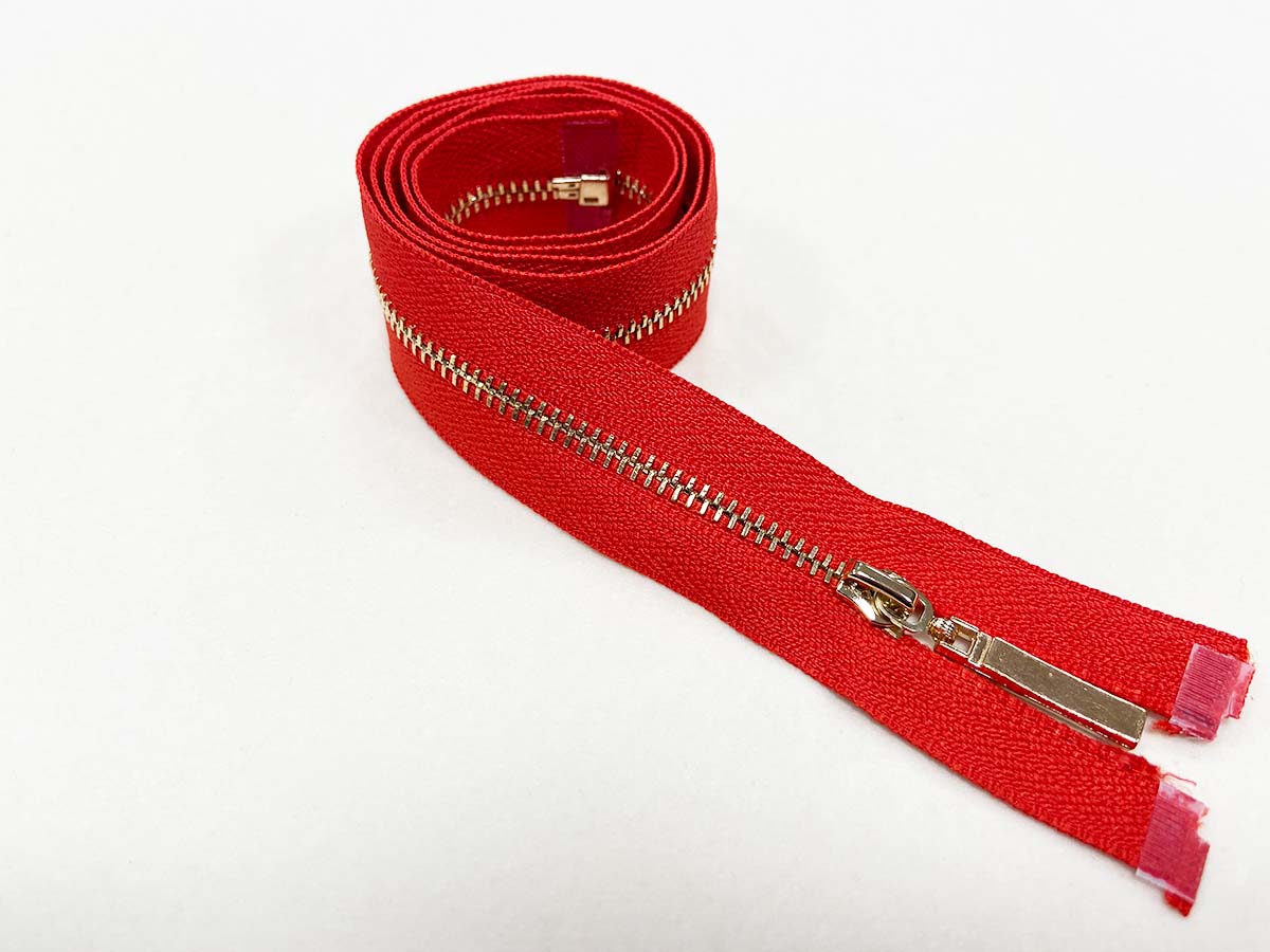 Reißverschluss in rot/gold - teilbar    