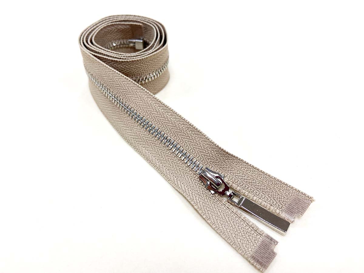 Reißverschluss in beige/silber - teilbar 